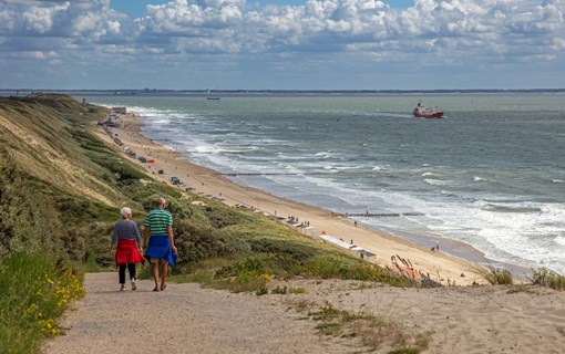 People walking near the beach in Zeeland